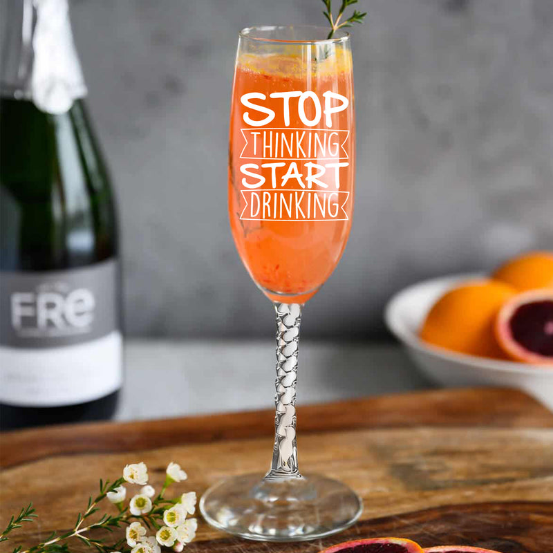 Engraved Stop Thinking Start Drinking Flute Glass
